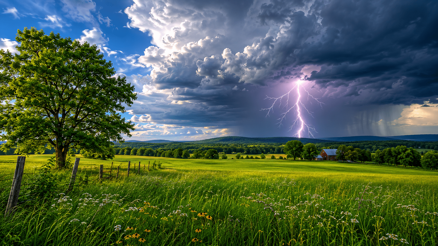A bright summer thunderstorm breaking over a still green field, with a single flash of lightning.